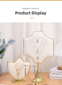 Macro detail of luxury jewelry display stand with necklaces and rhinestone earrings