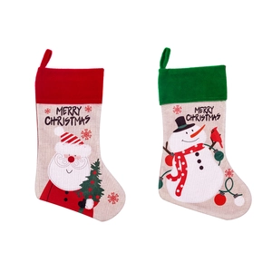 Classic red Santa and green Snowman Christmas stockings with Merry Christmas embroidery