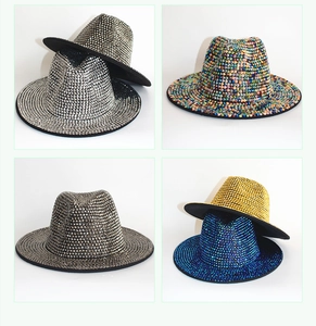 Close-up of sparkling rhinestone fedora hats in silver, gold, and vibrant luxury colors