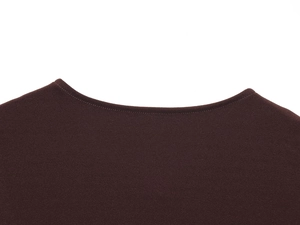 Close-up of the round neckline and textured dark brown knit fabric on a women's vest