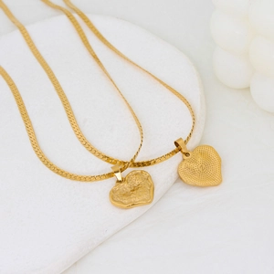 Minimalist gold plated stainless steel heart necklaces with Z letter pendant on stone tray