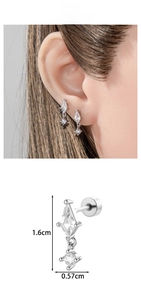 Detailed view of kite-shaped zircon ear stud with dimensions and piercing style