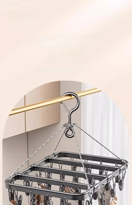 Detail view of the durable dark grey aluminum drying rack with 20 sturdy metal clips