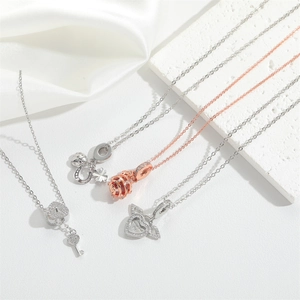 Exquisite S925 silver and rose gold heart pendants featuring lock and key motifs