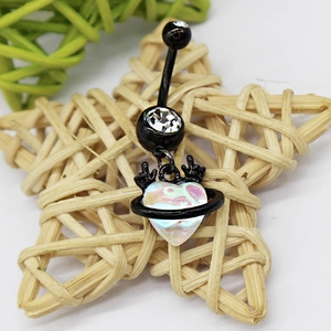 Detail showing black crescent moon belly ring with iridescent heart and crystal accents