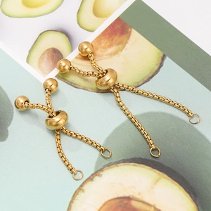 Detail of adjustable gold stainless steel slider chain with small beads for DIY jewelry