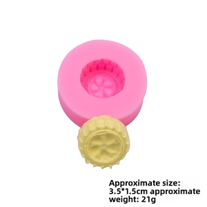 Detail of pink silicone tire mold showing 3.5x1.5cm dimensions and yellow resin sample