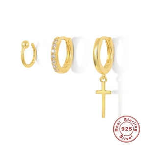Three-piece set of golden 925 sterling silver earrings including stud and ear cuffs