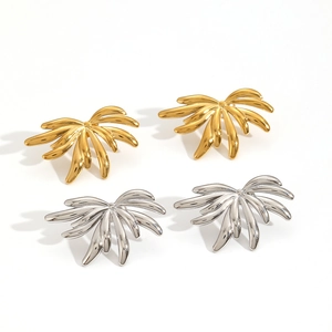Elegant wing-shaped stainless steel earrings in polished gold and silver finishes