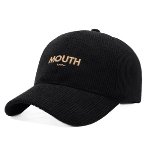 Fashionable black waffle knit baseball cap with gold MOUTH embroidery in center