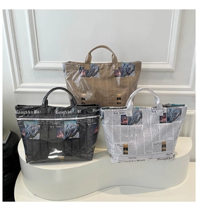 Waterproof PVC bucket bags with retro newspaper print in khaki, black and white colors