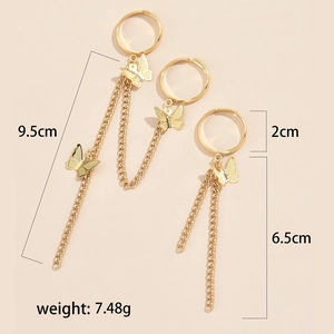 Detailed view of golden butterfly ring and chain bracelet set with precise measurements