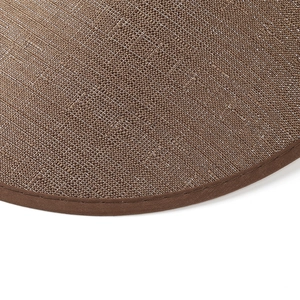 Detailed macro view of high-quality brown woven straw texture and durable stitched edging