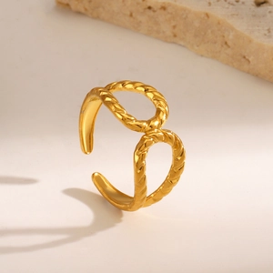 Gold adjustable twisted rope ring featuring a unique hollow double teardrop figure-eight design