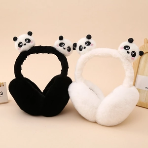 Detail of plush panda ear muffs in black and white with soft fleece and cute animal design
