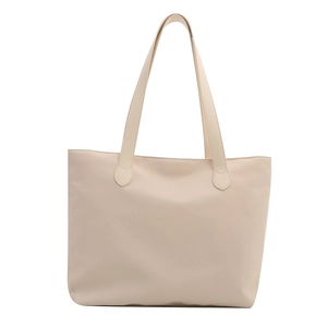 Minimalist beige PU leather tote bag with long handles and spacious interior design