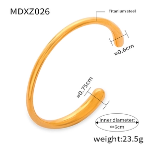 Detail view of gold titanium steel cuff bracelet with dimensions and weight specs