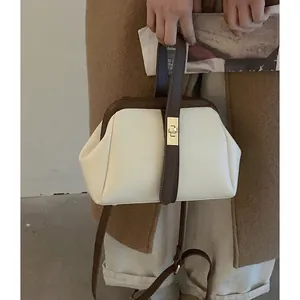 Retro contrast color doctor bag with gold clasp and adjustable strap in beige and brown