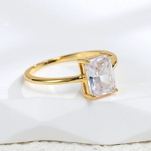 Elegant gold square cubic zirconia ring with minimalist band and large rectangular stone