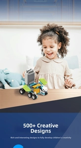Close-up of girl playing with motorized building block car featuring 500+ creative models