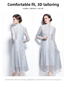 Dettaglio dell'abito in pizzo azzurro con ricami fini e silhouette a trapezio elegante