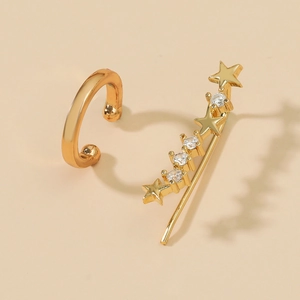Detailed view of gold star ear crawler and cuff set with sparkling zircon stones