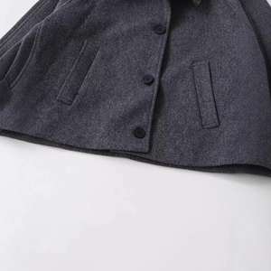 Women's dark gray short wool jacket featuring high-quality fabric and three dark buttons