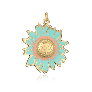 Detail of sunflower pendant with mint green enamel petals and golden metal center
