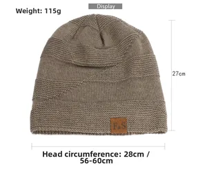 Detail of dark coffee knit beanie showing textured wave pattern and F&S leather patch