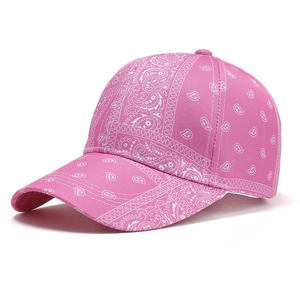Close-up of pink paisley pattern print on a premium cotton fabric baseball cap