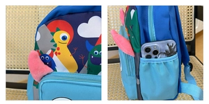 Detail of blue monster backpack with 3D pink ears and side elastic pocket for kids