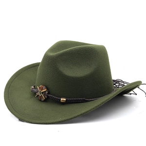 Dark green wide brim felt cowboy hat with vintage woven band and metal floral accents