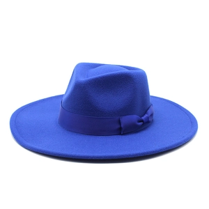 Detailed view of the dark blue wide brim wool fedora hat with elegant ribbon bow decoration