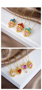 Macro shot of titanium steel necklace with pink crown heart pendant and colorful crystals