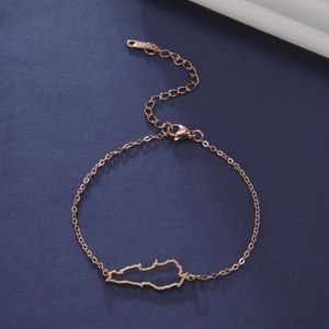 Detail of rose gold stainless steel bracelet featuring a Kentucky map outline charm