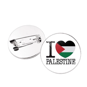 Round Palestine map heart pin badge with safety pin back on white background