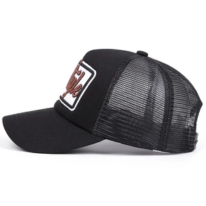 Black mesh trucker hat with 3D embroidery style patch and curved brim on white backdrop