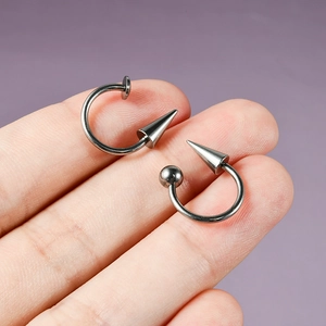 G23 titanium pointed cone horseshoe ring for nose and ear piercing with spike detail