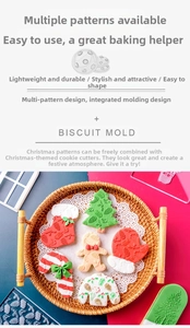 Close-up of decorated Christmas cookies shaped like trees and gingerbread men