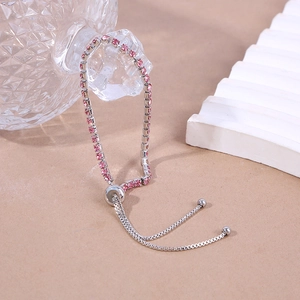 Detailed view of pink 2.5mm zircon bracelet with adjustable silver sliding closure