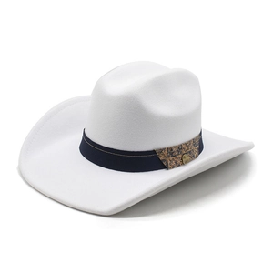 Close-up of a white felt fedora hat featuring a navy band with retro geometric patterns