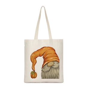 Detail of beige canvas tote bag with cartoon gnome pumpkin print for Halloween