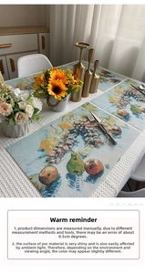 Macro detail of PVC placemat featuring classic oil painting style fruit patterns