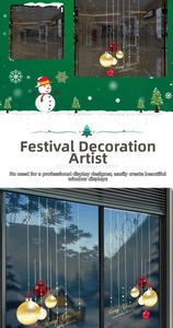 Detail of red and gold Christmas ball window clings with snowman and snowflake patterns