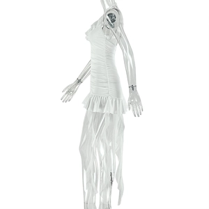 Detail of white ruffled mini dress featuring side ruched fabric and asymmetric hemline