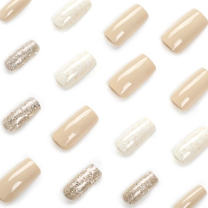 Glossy nude, white glitter, and silver sequin coffin press-on nails set on white background