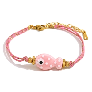 Pink woven rope bracelet with 18K gold fish ceramic charm and adjustable lobster clasp