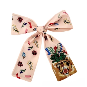 Pink silk bow keychain pendant featuring vintage floral patterns and tiger head prints