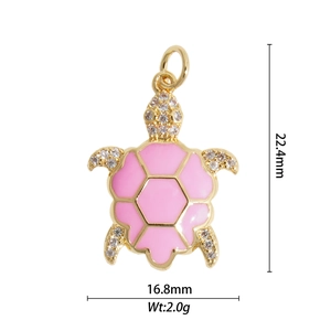 Detailed size view of pink enamel sea turtle pendant with 18K gold plating and cubic zirconia