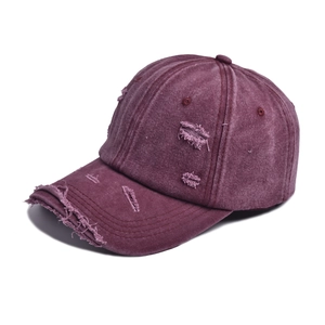Distressed burgundy washed cotton baseball cap with vintage frayed brim details